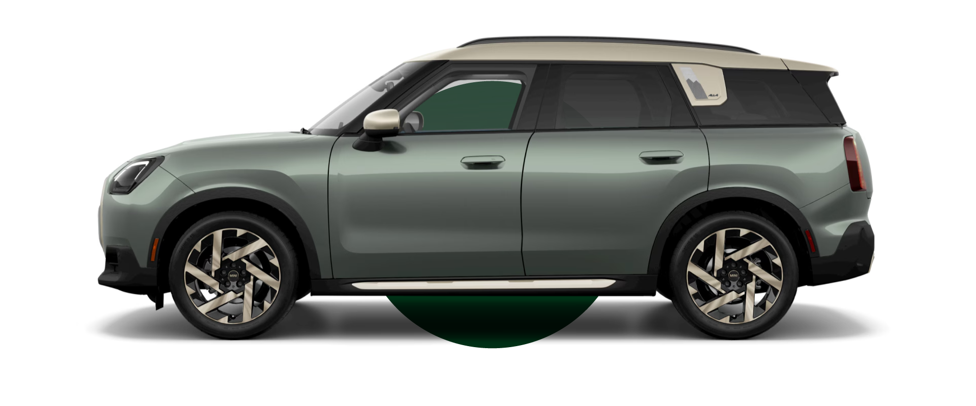  Side view of a MINI Countryman S ALL4 in the Smokey Green body color, facing left with its shadow underneath it.