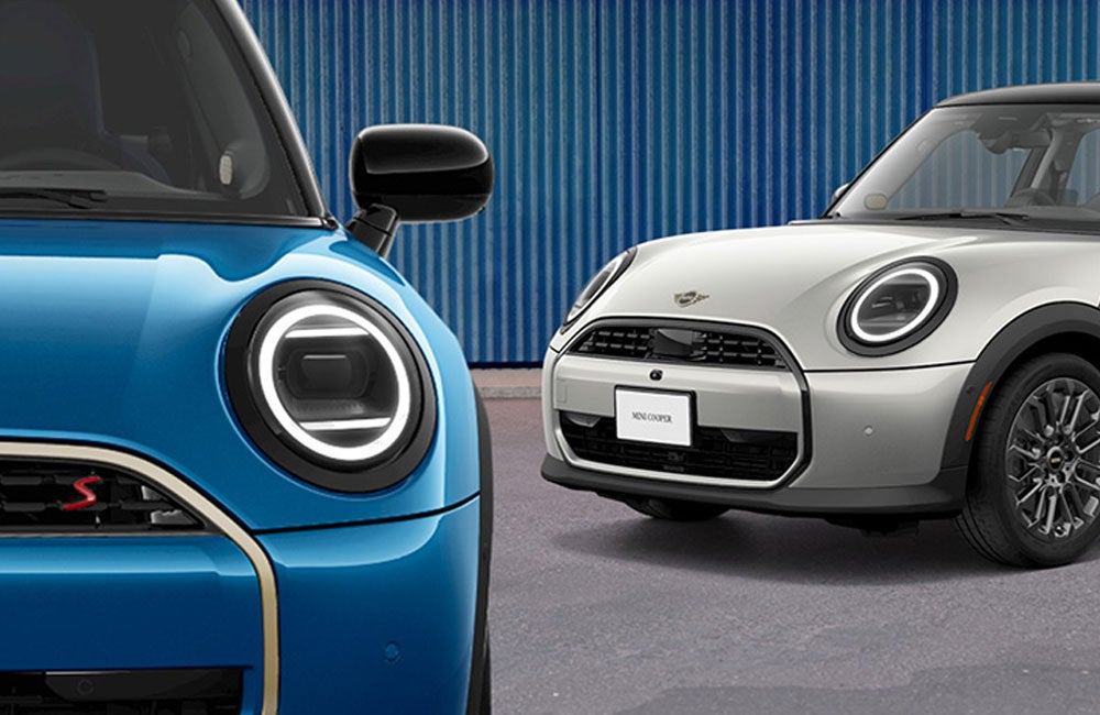 Two MINIs parked outside