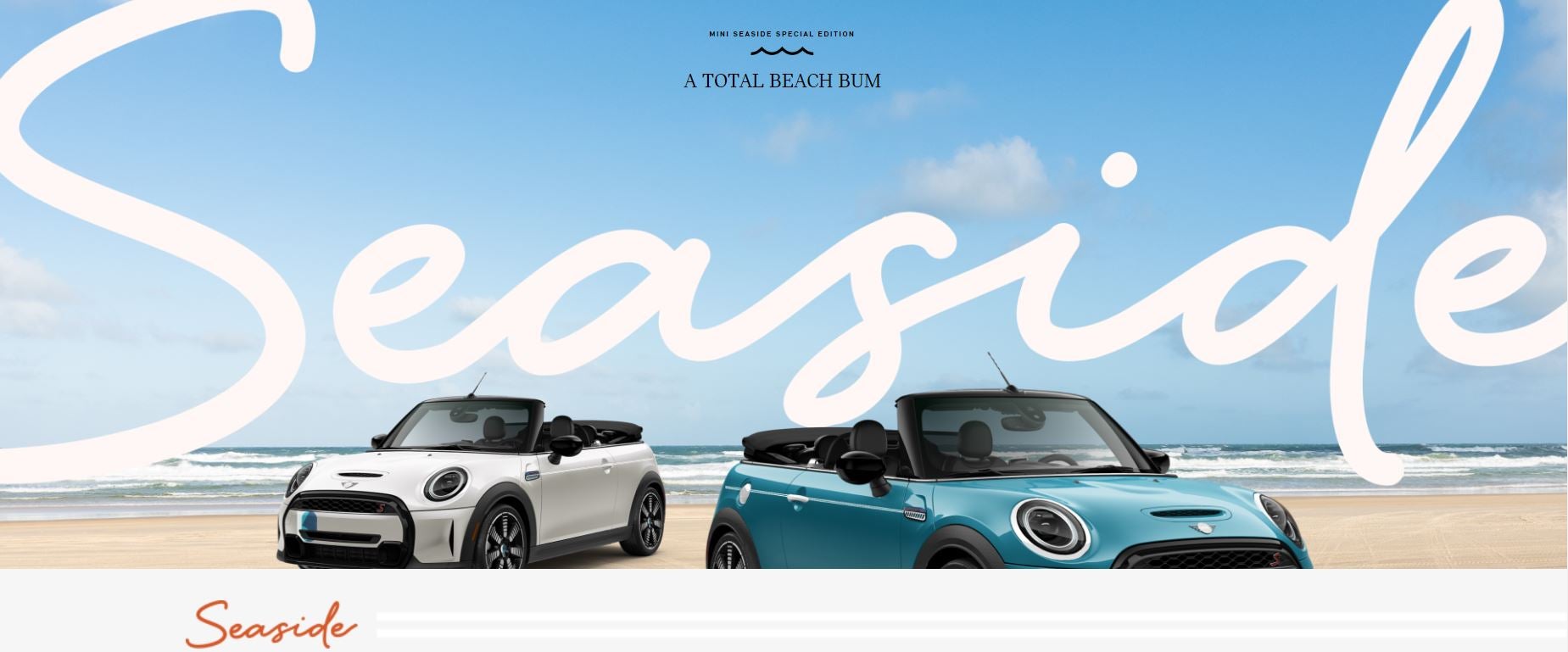 Two MINI Seaside Edition vehicles, one in Caribbean Aqua, one in Nanuq White, parked side-by-side on a beach with the word Seaside in the background.