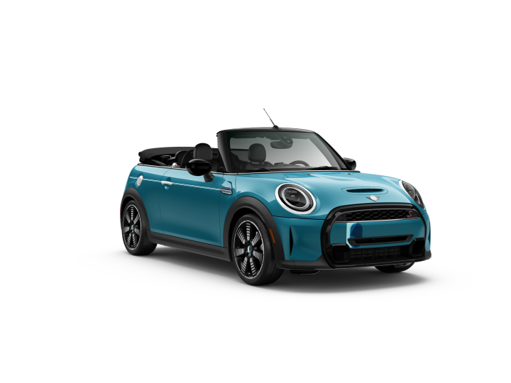 Three-quarters front view of a MINI Cooper S Convertible Seaside Edition in Caribbean Aqua, parked on a blank white surface with its shadow underneath it and nothing in the background.